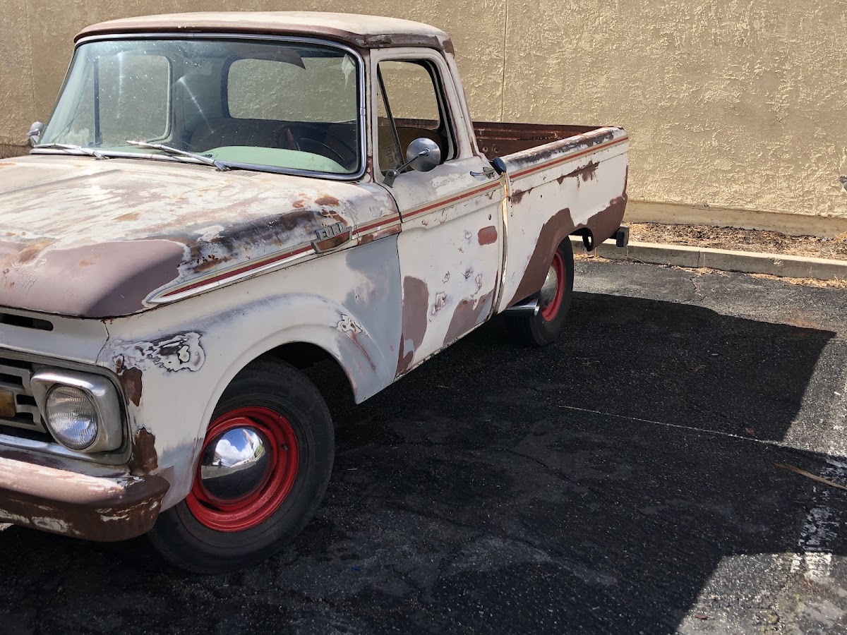 A vintage Ford F100 patina project truck at Our King Auto Repair