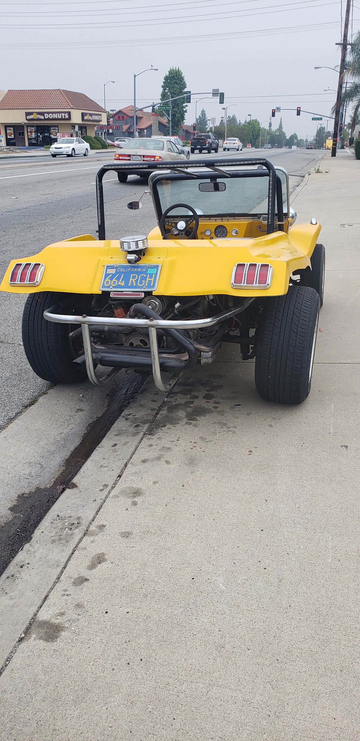 A custom yellow dune buggy worked on at Our King Auto Repair
